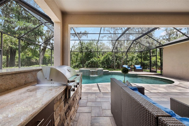 15912 Ternglade Dr, Lithia, FL 33547 - view of pool with a patio area, glass enclosure, and a pool with connected hot tub