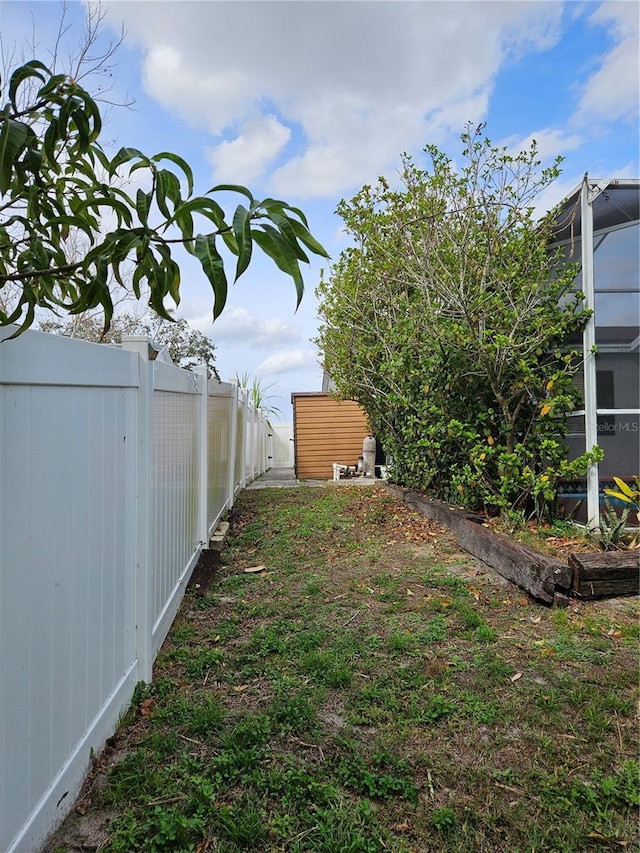 view of yard with fence