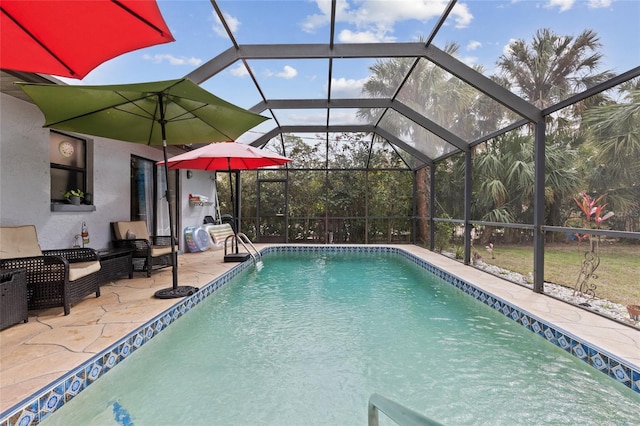 pool featuring a lanai and a patio