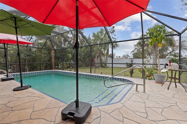 view of swimming pool with glass enclosure, a patio area, and a fenced in pool