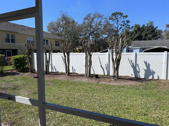 view of yard featuring fence