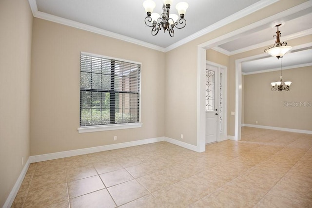 unfurnished room with a chandelier, crown molding, and baseboards