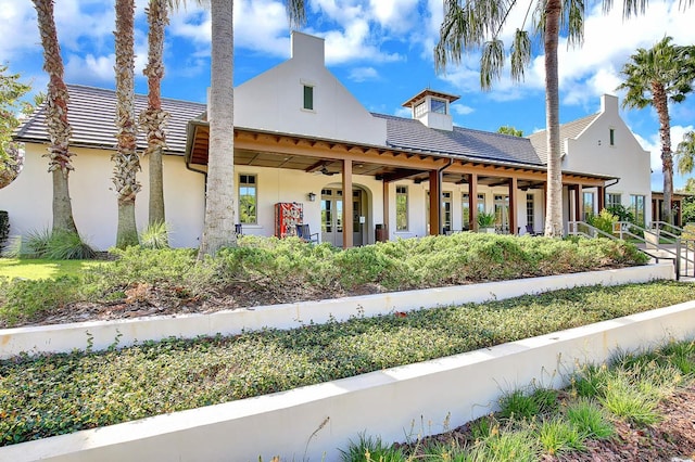 15708 Oakleaf Run Dr, Lithia, FL 33547 - view of front of property featuring a tiled roof, a ceiling fan, french doors, and stucco siding