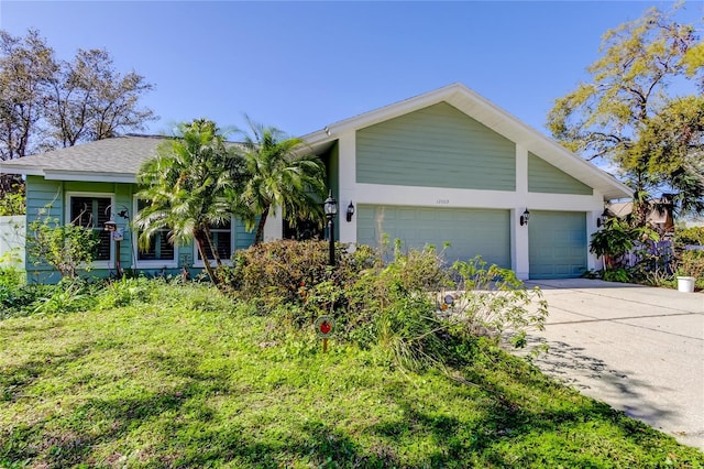 view of front of house with a garage and driveway