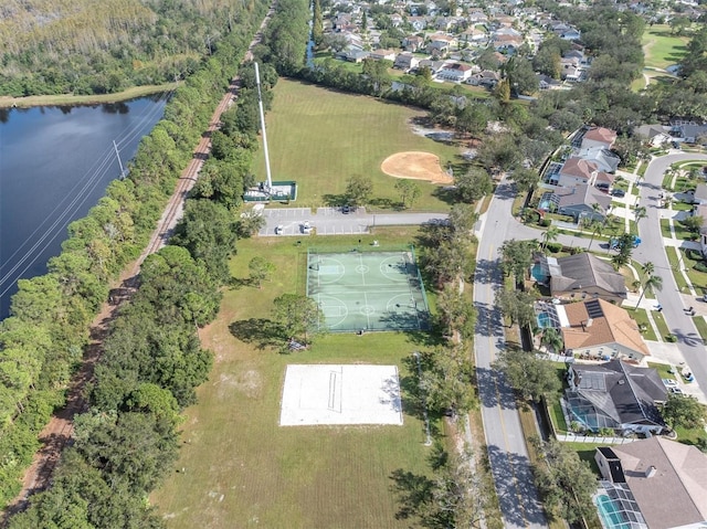 aerial view featuring a water view and a residential view