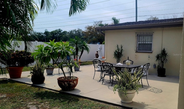 view of patio / terrace with fence and outdoor dining space