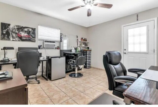 office space featuring light tile patterned floors, ceiling fan, and cooling unit