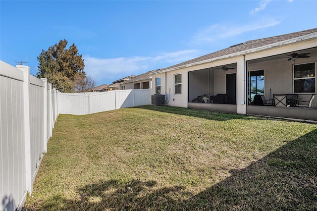 10604 Scenic Hollow Dr, Riverview, FL 33578 - view of yard with a sunroom, a fenced backyard, cooling unit, and a ceiling fan