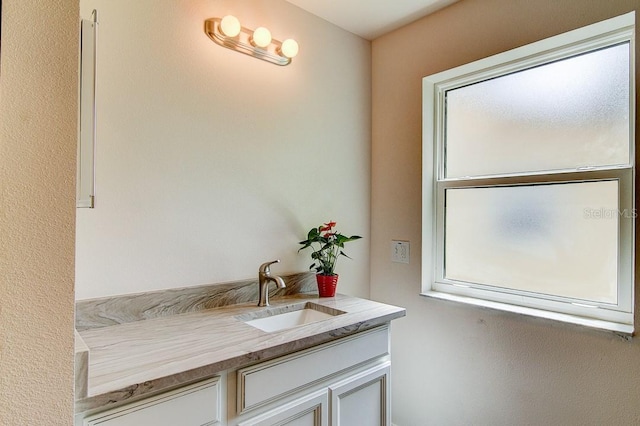 interior space with a wealth of natural light and vanity