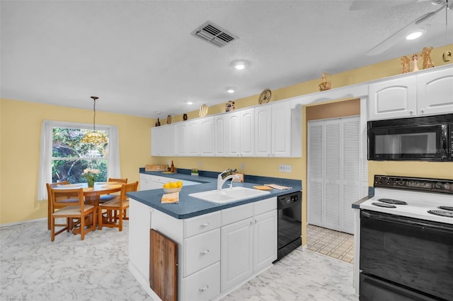 kitchen with visible vents, white cabinets, marble finish floor, black appliances, and a sink