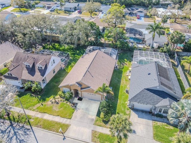 birds eye view of property with a residential view