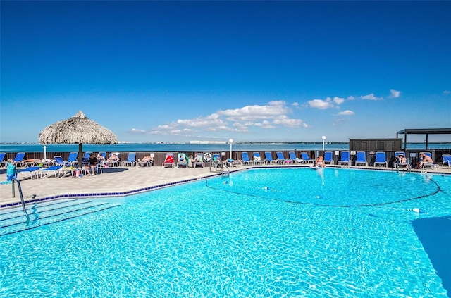 community pool with a patio area