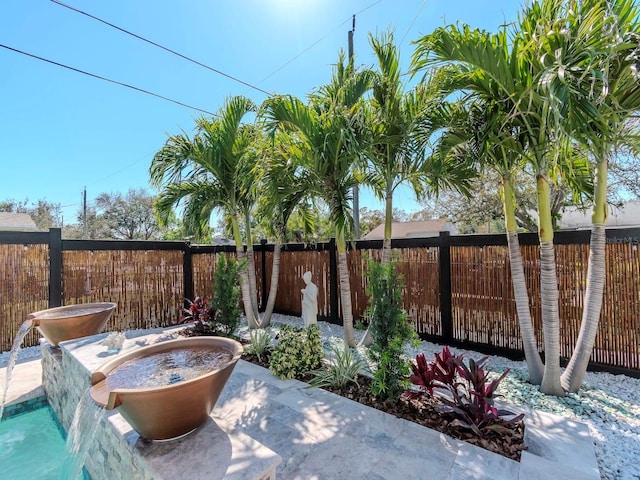 view of patio featuring a fenced backyard