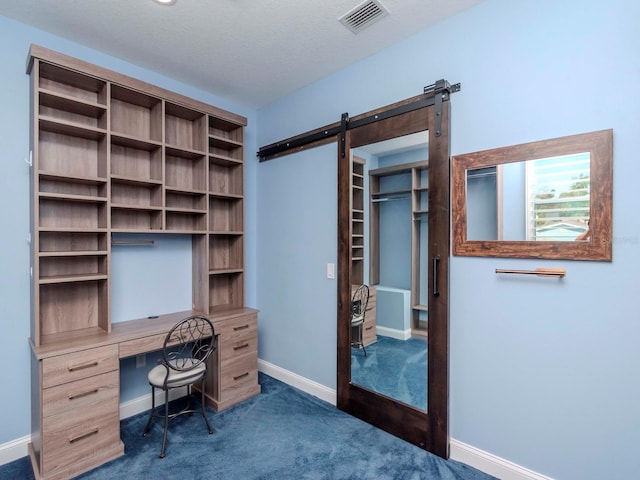 5526 14th Ave S, Gulfport, FL 33707 - unfurnished office featuring a barn door and dark carpet