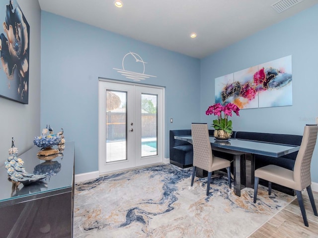 5526 14th Ave S, Gulfport, FL 33707 - office area featuring french doors, wood finished floors, and recessed lighting