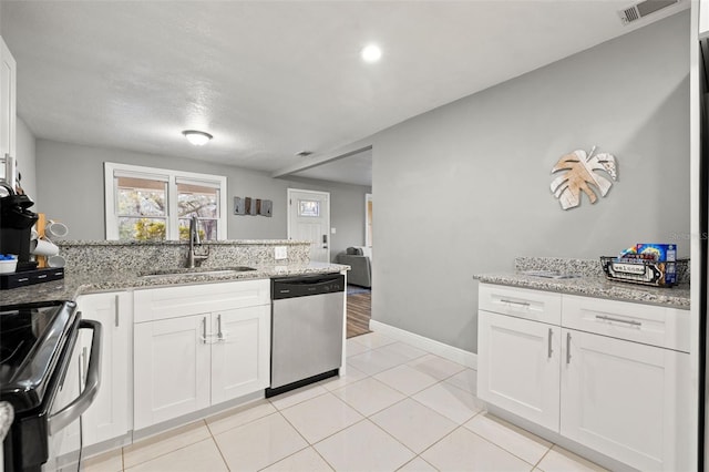 kitchen featuring visible vents, black range with electric stovetop, stainless steel dishwasher, white cabinets, and a sink