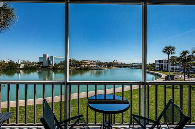 balcony featuring a water view