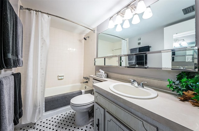 full bath with visible vents, toilet, shower / tub combo with curtain, tile patterned floors, and vanity