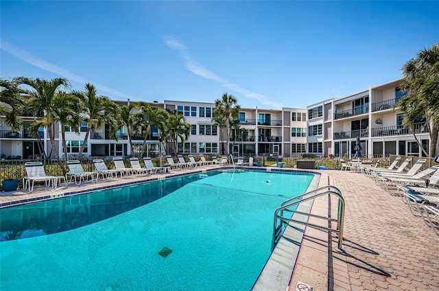 community pool with a patio