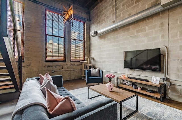 living area featuring concrete floors