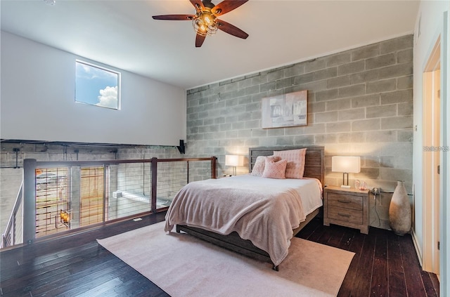 bedroom with dark wood finished floors and a ceiling fan