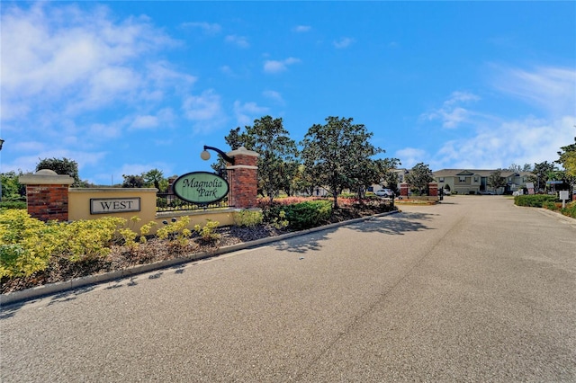 view of road featuring curbs and a residential view