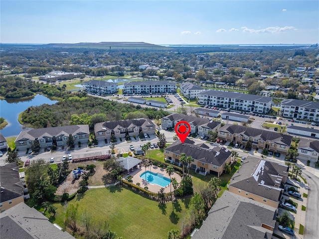 bird's eye view with a residential view and a water view