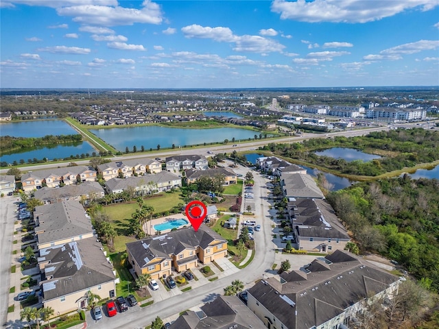 aerial view with a water view and a residential view