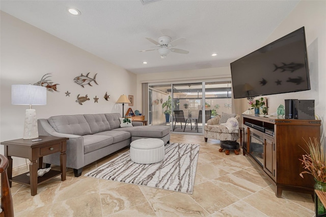 living room featuring ceiling fan and recessed lighting