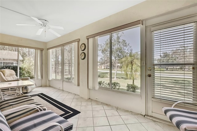 sunroom with a ceiling fan