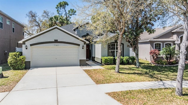 ranch-style house featuring a garage, concrete driveway, a front lawn, and stucco siding