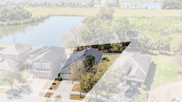 aerial view featuring a water view and a residential view