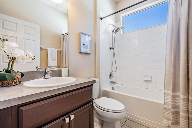 bathroom with shower / bath combo, tile patterned flooring, vanity, and toilet