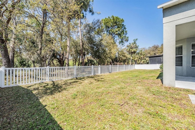 view of yard featuring a fenced backyard