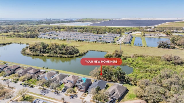 aerial view with a residential view and a water view