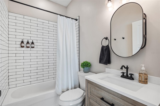 bathroom featuring shower / tub combo, vanity, and toilet