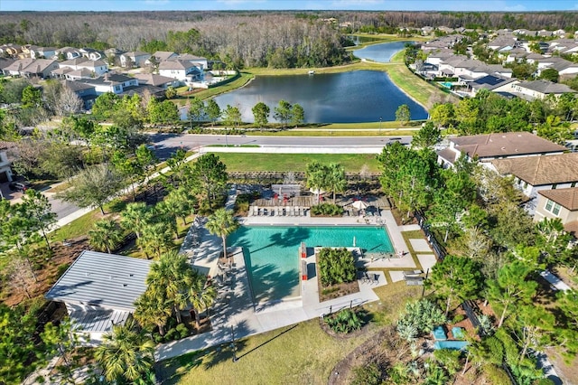 bird's eye view with a water view and a residential view