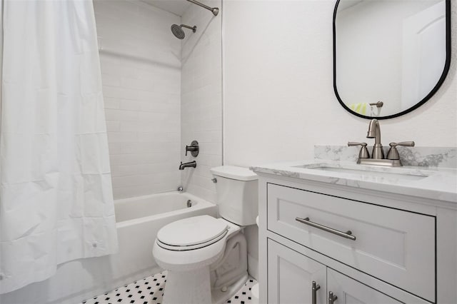 full bathroom with toilet, shower / bath combination with curtain, and vanity