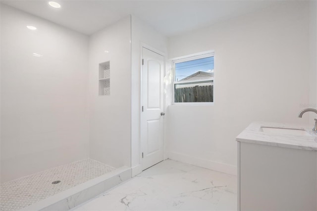 full bathroom with recessed lighting, vanity, baseboards, marble finish floor, and a shower stall