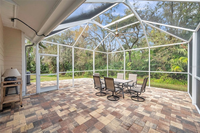 view of patio / terrace featuring a lanai