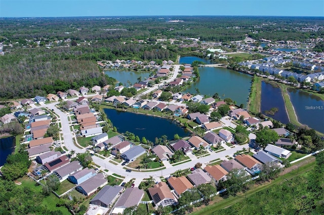 aerial view with a residential view and a water view