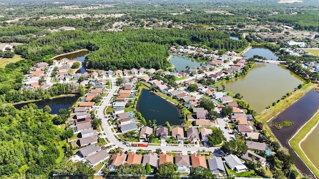 aerial view featuring a water view and a residential view