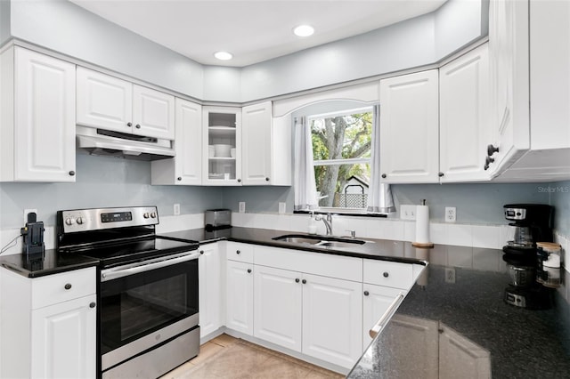 kitchen featuring white cabinetry, stainless steel range with electric stovetop, under cabinet range hood, and a sink