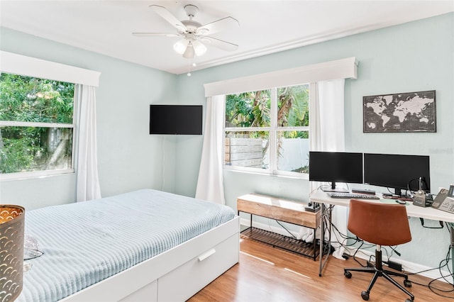 bedroom with light wood-style floors