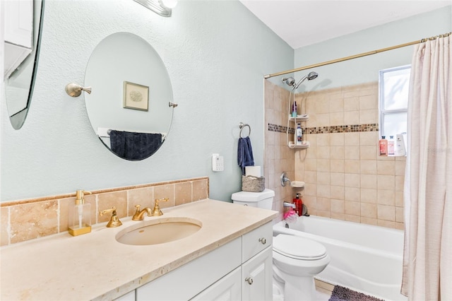 bathroom featuring tasteful backsplash, toilet, shower / bath combo with shower curtain, and vanity