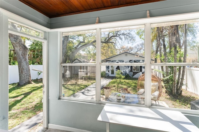 sunroom with wood ceiling