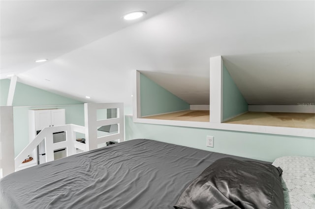 bedroom with recessed lighting and vaulted ceiling