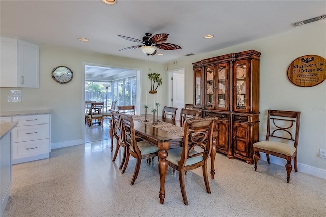 dining room with light speckled floor, recessed lighting, visible vents, and baseboards