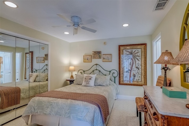 bedroom with recessed lighting, visible vents, light carpet, ceiling fan, and baseboards