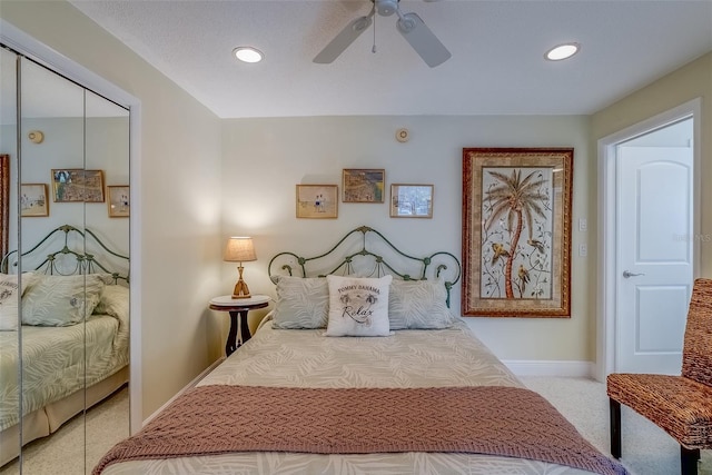 carpeted bedroom with recessed lighting, ceiling fan, and baseboards